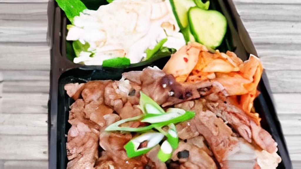 Bulgogi Beef Over Rice · -Grilled Beef with Bulgogi Sauce, Greens, Pickle Vegetables, Sprinkle Seaweed Sesame Powder Over Rice