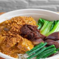 Kare-Kare · Short Rib and brisket in rich peanut sauce, eggplant, green beans, bok choy served with shri...