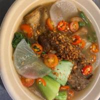 Sinigang Na Baka · Beef Short rib sinigang (sour tamarind soup) green beans, bokchoy, tomato, eggplant, radish