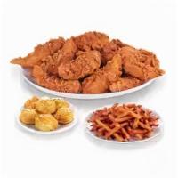 Chicken & Tenders Family Meal /2 L Soda · 12 Pcs Chicken
6 Tenders, 6 Biscuits & Family Fries
Includes 3 Dipping Cups &  2 Litre Pepsi...