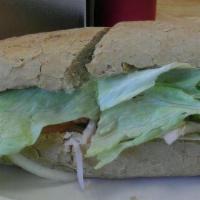 Turkey & Cheese Sandwich · Delicious sandwich made with Turkey and melted cheese. Topped with lettuce, tomatoes, onions...