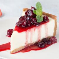 Cherry Cheesecake · Classic cheesecake with a rich, dense, smooth, and creamy consistency topped with a deliciou...