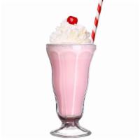 Strawberry Milkshake · Creamy Strawberry milkshake topped with whipped cream.