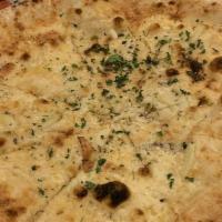Garlic Focaccia · Thin crust focaccia, garlic, sea salt, Sicilian oregano, extra virgin olive oil, Italian par...