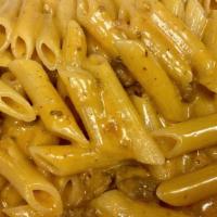 Pappagallo Pasta · A pink creamy cheese and meat sauce.