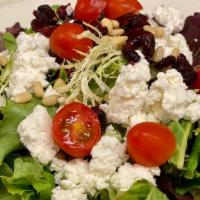 Insalata Dina · Goat cheese, mesclun fried greens, pine nuts, sun-dried cranberries, and sliced grape tomato...