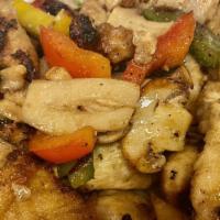 Chicken Shoemaker · Peppers mushrooms & fresh garlic.