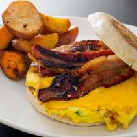 -Breakfast Sandwich · Choice of Thick Cut Bacon or Taylor Ham with chive scrambled eggs, cherry pepper jam and Ame...