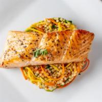 Fresh Scottish Salmon · With vegetable couscous.