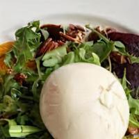 Beets & Burrata · Red and golden beets, arugula, toasted hazelnuts, burrata and honey balsamic.