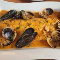 Branzino Marechiara · Sautéed with clams, mussels, white wine, and a touch of tomato sauce.
