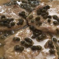 Veal Piccata · Veal scallopini sautéed with capers, lemon, and white wine.