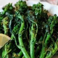 Broccoli Rabe · sauteed with garlic and oil