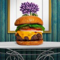 Age Of Vegan Cheese Burger · Seasoned homemade vegan patty topped with melted vegan cheese, lettuce, tomato, onion, and p...