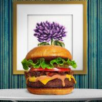 The Vegan Burger Project · Seasoned homemade vegan patty topped with your favorite choice of toppings! Served on a vega...