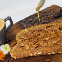 Almond Butter Toast · Multigrain bread topped with almond butter, toasted almond & honey