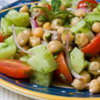 Lima Bean Salad · Mixed greens and lima beans with olive oil and vinegar.