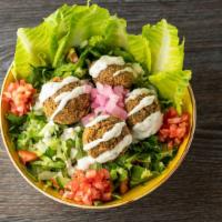 Falafel Salad · Delectable falafel prepared with lettuce, tomato and onion.