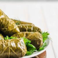 Grape Leaves · Ten stuffed grapes with delicious rice and Mediterranean spices. Served with an organic fiel...