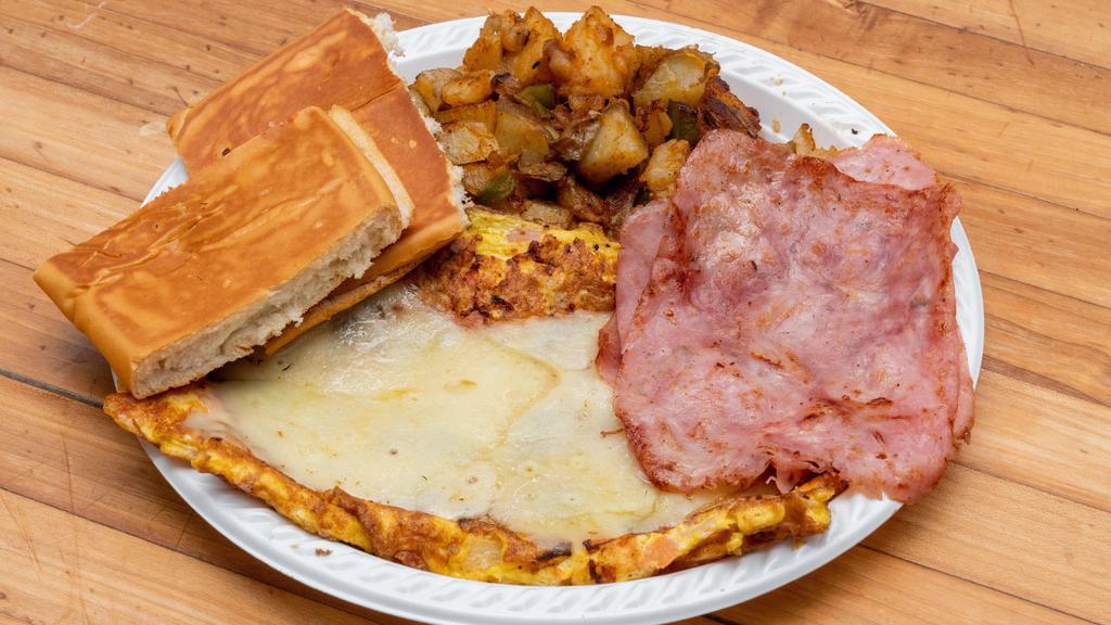 Home Fries, 2 Eggs, Bacon, Ham Or Sausage · Includes Coffee or Orange Juice