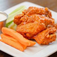 Wings (6) · Tossed in buffalo, BBQ or hot honey.