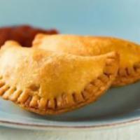 German Kielbasa Empanadas · German sausage and sauerkraut. Grande empanadas, rice, and beans.