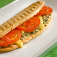 Tuna Melt Panini · Fresh hot panini with homemade tuna salad, cheddar cheese, lettuce, and slices of tomatoes. ...