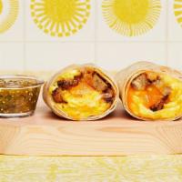 Chicken Sausage Breakfast Burrito · Two scrambled eggs, chicken sausage, breakfast potatoes, and melted cheese wrapped in a fres...