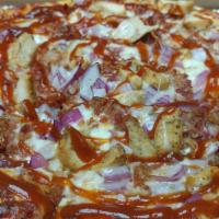 Bbq Chicken Pizza · BBQ sauce topped with chicken, onions, bacon, and cheese.