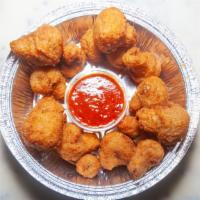 Breaded Mushrooms (16) · Fresh hand-breaded mushrooms, deep fried to a golden brown color.