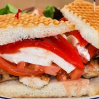 Eaton Town Panini · Grilled chicken, roasted peppers, tomato, fresh Mozzarella, and balsamic vinegar.