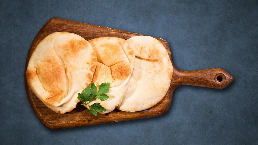 Classic Pita · A yeast-leavened round flatbread baked out of wheat flour served as aside.
