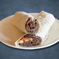 Lamb Wrap Sandwich Lust · Made with savory ground lamb generously seasoned with spices and fresh mint, a slathering of...