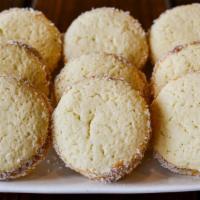 Alfajores De Maicena · Cornstarch cookie filled with dulce de leche. 12 units