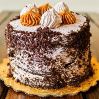 Chocolate Cake · Dulce de Leche and Chocolate Mouse 
(6 to 10 people=