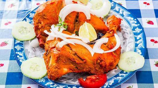 Tandoori Chicken · Spicy yogurt marinated, cooked in clay oven.