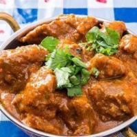 Lamb Curry · Succulent pieces of lamb in cardamom sauce & paprika flavored.