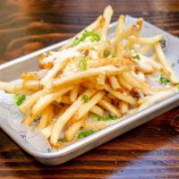 Truffle Cheese Fries · Parmesan cheese, truffle oil and scallion.