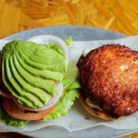 Bib Chicken Burger · House made breaded chicken patty, lettuce, onion, tomato, avocado, cilantro, ginger lemon\ l...