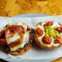 Chistorra Burger · 5 oz. All natural beef, provolone cheese, organic scramble egg, chistorra sausage, Spanish p...