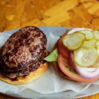 The Classic Double Burger · Double 4 oz patty all natural beef. Select your toppings.