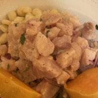 Ceviche De Pescado · Raw blue snapper fish marinated in fresh lime juice, mixed red onions, cilantro, and hot pep...
