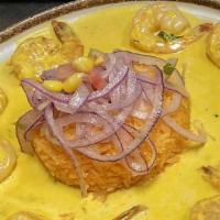 Camaranes Cuzco · Sautéed shrimps in gji Amarillo, garlic, cilantro and white wine, served with yellow rice an...