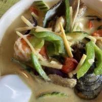 Green Curry · Bamboo shoot, zucchini, bell pepper, eggplant, coconut milk, and basil.