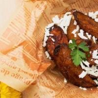 Sweet Plantains · With white cheese.