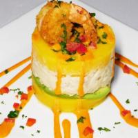 Causa Marina · Cold mashed potato infused with key of lime juice, pressed into a cake with shrimp.