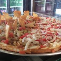 Taco Pizza · Seasoned ground beef with lettuce, tomato & cheddar cheese.