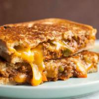 Grilled Cheese Sloppy Joe · Sloppy Joe Meat, American Cheese on buttery toasted white bread.