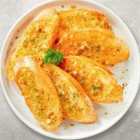 The Great Garlic Bread · (Vegetarian) Housemade bread toasted and garnished with butter, garlic, and parsley.