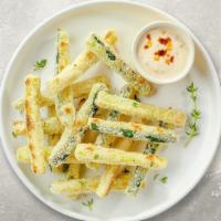 Super Zucchini Fries · (Vegetarian) Sliced zucchini breaded and fried until golden brown. Served with your choice o...